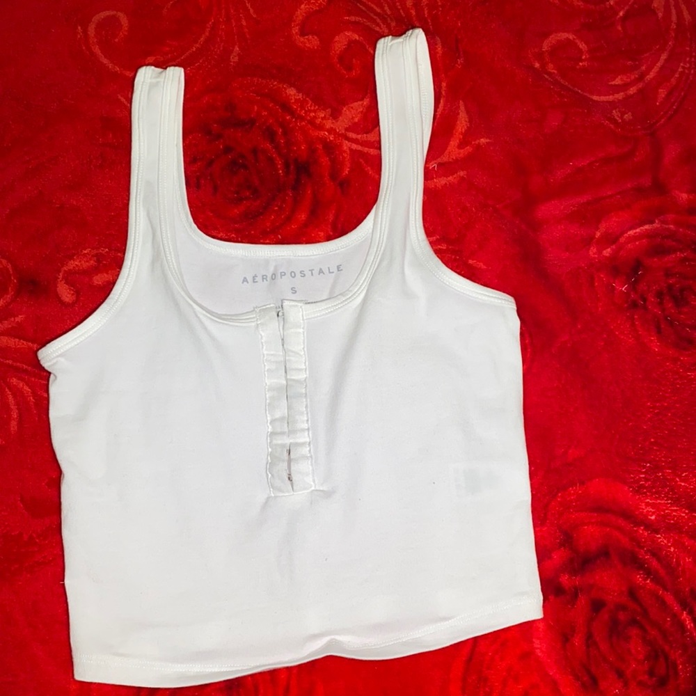A white crop top brand never never wore